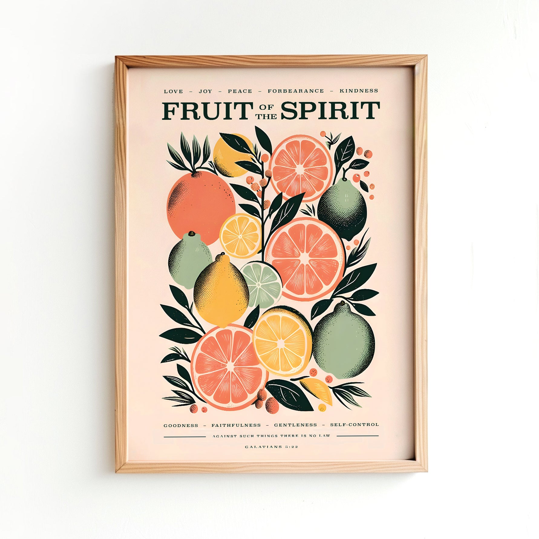 Person holding a framed Fruit of the Spirit Galatians 5:22 poster featuring vibrant citrus fruits Christian wall art perfect for modern faith-based home decor