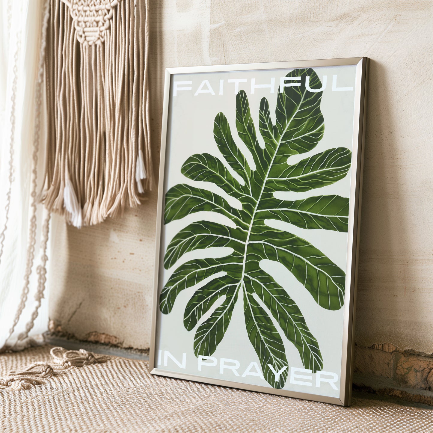 Faithful in prayer framed botanical print with green leaf displayed against boho macrame wall decor ideal for creating a serene and faith-filled atmosphere in any home, modern wallart prints, bible verse wall art Romans 12 12