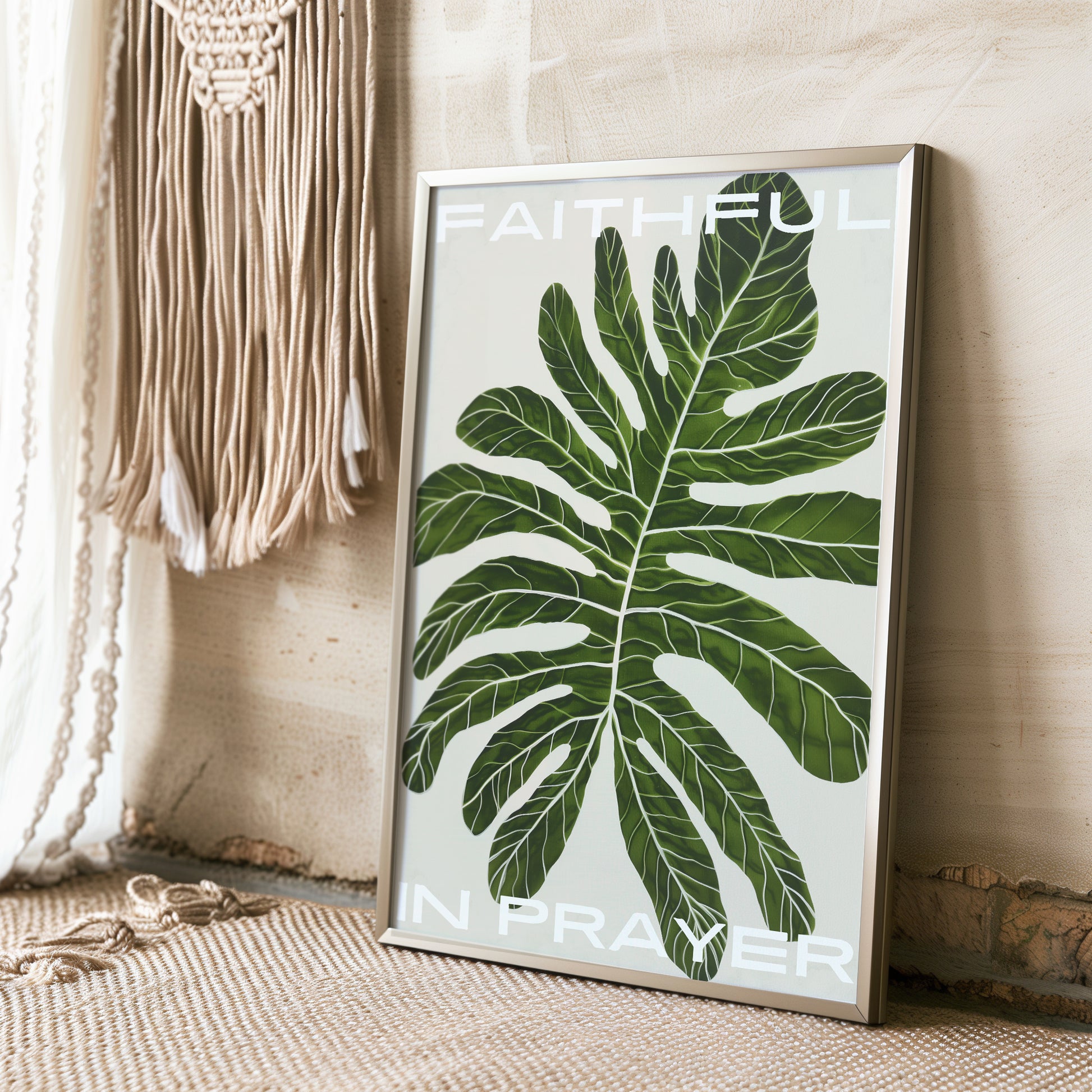 Faithful in prayer framed botanical print with green leaf displayed against boho macrame wall decor ideal for creating a serene and faith-filled atmosphere in any home, modern wallart prints, bible verse wall art Romans 12 12