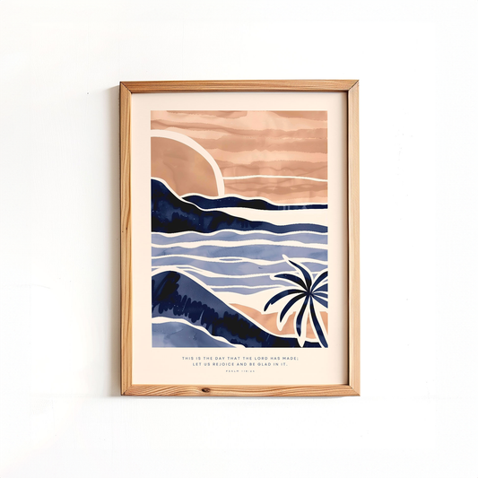 Framed Psalm 118:24 poster print featuring a modern beach landscape with a sunset, palm tree, and mountains. Ideal for Christian home decor or scripture-based artwork for a serene space.